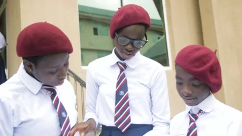 Group of students in school campus discussing and  walking together Stock Footage 252350501