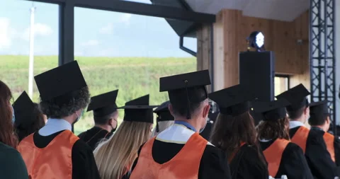 Group of students square academic cap hat waiting for award bachelor MBA, school Stock Footage 138742792