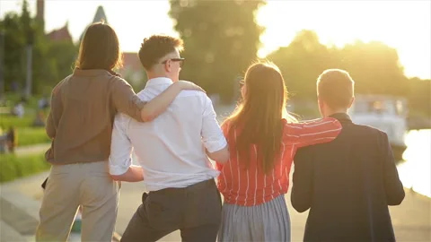 Group Of Students Staying at Park Together. Young People Cheering With Beer Stock Footage 111763641
