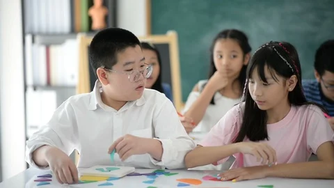 Group of Students study math with teacher in the classroom Stockbeeldmateriaal 105837941