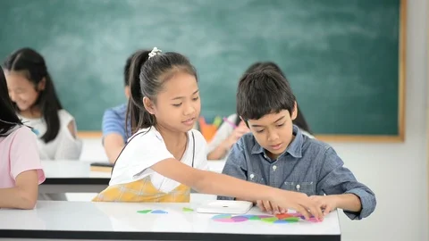 Group of Students study math with teacher in the classroom Stockbeeldmateriaal 105837943
