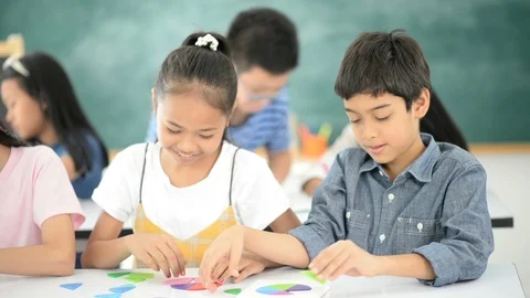 Group of Students study math with teacher in the classroom Stockbeeldmateriaal 105837950