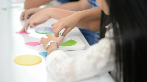 Group of Students study math with teacher in the classroom Stockbeeldmateriaal 105837978