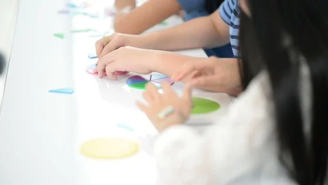 Group of Students study math with teacher in the classroom Stockbeeldmateriaal 105837981