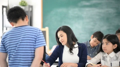 Group of Students study math with teacher in the classroom Stockbeeldmateriaal 105837996