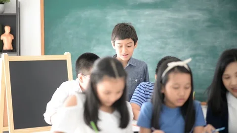 Group of Students study math with teacher in the classroom Stockbeeldmateriaal 105838001