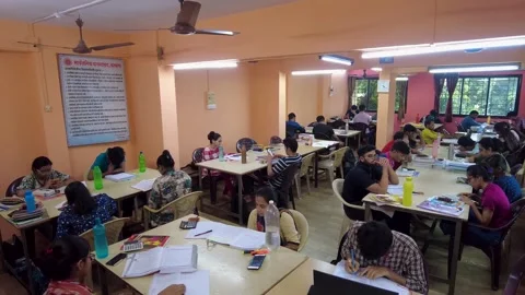 Group of students study together in College Library. Stock Footage 220499318
