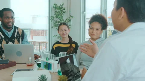 Group of students studying and playing with teacher, education and learning c Видео 171173421