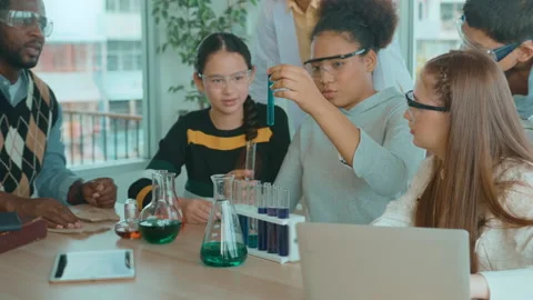 Group of students studying and playing with teacher, education and learning c Stock Footage 171173809