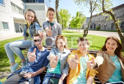 Group of students with tablet pc at school yard Stock Photos