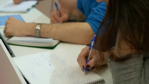 Group of students taking notes in university lecture Stock Footage 75555981