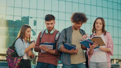 Group of Students Talk on Background of College. Young Leaders. Stock Footage 241444057