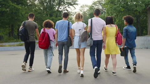 Group of students walking together outside Stock Footage 160458667