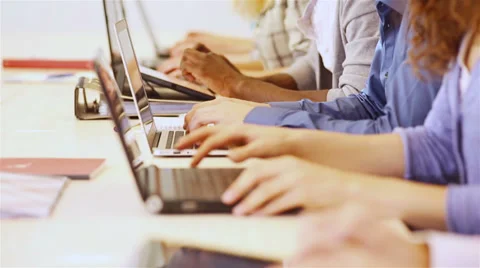 Group of students working on computer Video stock 33467384