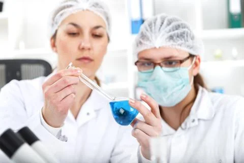 Group of the students working at the laboratory Stock Photos