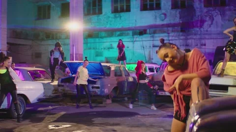 Group of stylish young people dancing , moving inside abandoned garage building Vídeos de archivo 158812406
