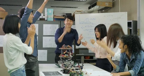 Group of successful creative engineers celebrating with their success. Video stock 94546514