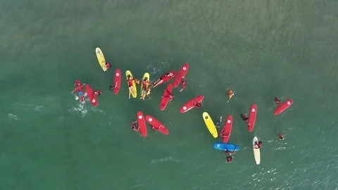 Group of surfboard students about to ride waves at Tel Aviv  beach in Israel Stock Footage 70396473