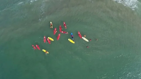 Group of surfboard students about to ride waves at Tel Aviv, beach in Israel Video stock 70397152