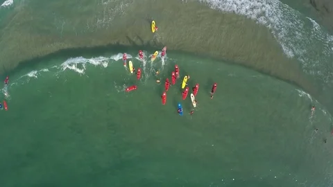 Group of surfboard students about to ride waves at Tel Aviv, beach in Israel. Stock Footage 70397606