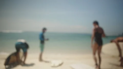 Group of surfers on the beach ready to surf. Stock Footage 91844972