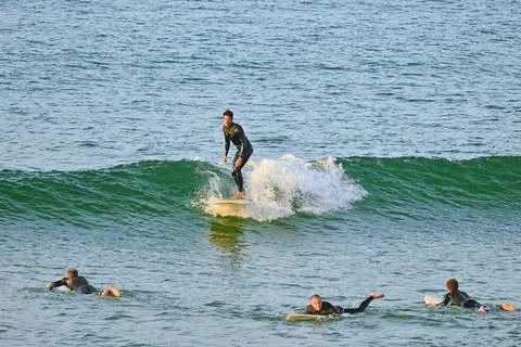 A group of surfers conquer the waves off Ferrol, (3), 21/08/2025 Stock Photos