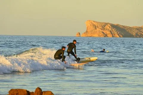 A group of surfers conquer the waves off Ferrol, (2), 21/08/2025 Stock Photos