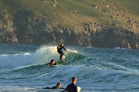 A group of surfers conquer the waves off Ferrol, (8),21/08/2025 Stock Photos