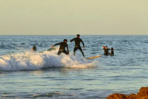 A group of surfers conquer the waves off Ferrol, (1), 21/08/2025 Stock Photos