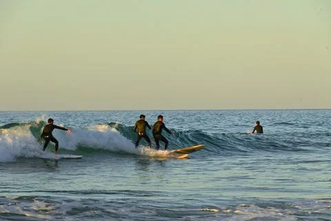 A group of surfers conquer the waves off Ferrol, (6) , 21/08/2025 Stock Photos