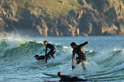 A group of surfers conquer the waves off Ferrol (14),  21/08/2025 Stock Photos