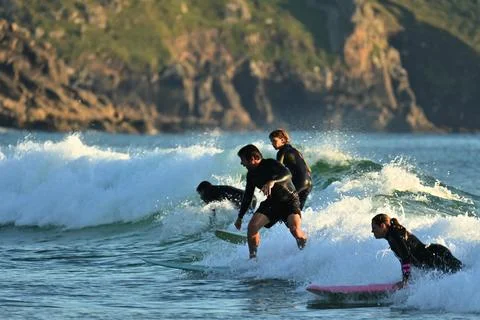 A group of surfers conquer the waves off Ferrol, (15) , 21/08/2025 Stock Photos