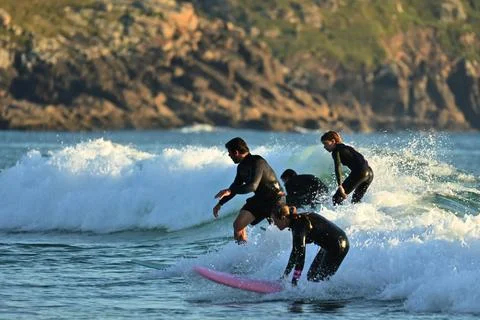 A group of surfers conquer the waves off Ferrol, (16) , 21/08/2025 Stock Photos