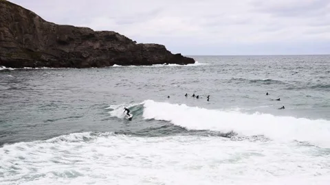 Group of surfers doing surf stunts Stock Footage 141045060