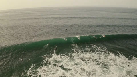  group of surfers ride on huge waves. Tenerife, Spain Stock Footage 133073331