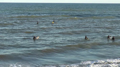 Group of Surfers Waiting Waves Slow Motion 動画素材 196890047