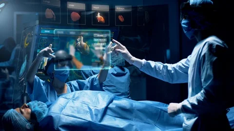Group of surgeons using augmented reality holographic holo lens headsets. Stock Footage 119544756