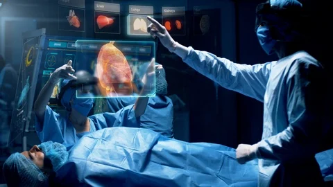 Group of surgeons using augmented reality holographic holo lens headsets. Stock Footage 119544764