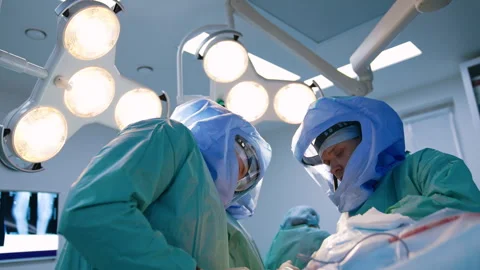Group of surgeons working at arthroscopic surgery. Stock Footage 247944908