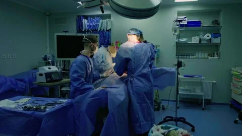 A group of surgeons works in the operating room. Stock Footage 270466305
