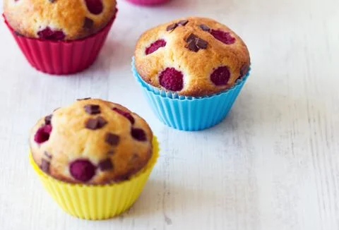 Group of tasty muffins placed on table Stock Photos