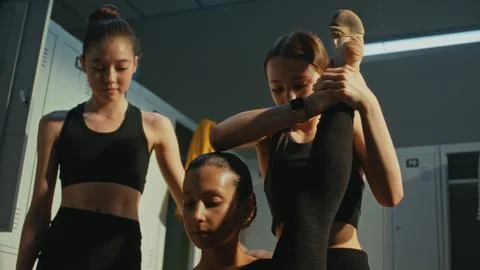Group of Teen Practicing Difficult Contortion Stretch Backstage Stock Photos
