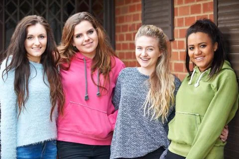 Group Of Teenage Female Friends In Urban Setting Stock Photos
