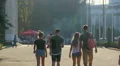 Group of teenage guys hanging around, walking in park, enjoying summer holidays HD Footage