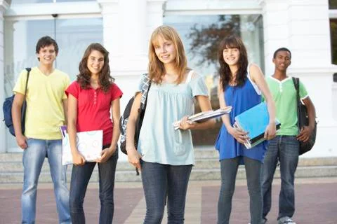 Group Of Teenage Students Standing Outside College Building Stock Photos