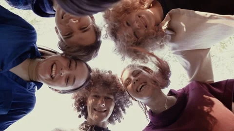 Group of teenagers looking down Stock Footage 260246344