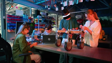 Group of teens doing experiments in robo... | Stock Video | Pond5
