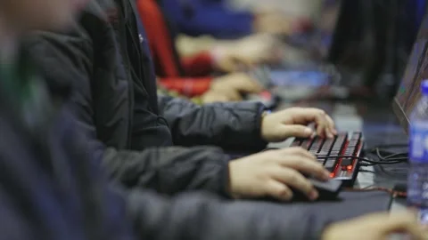 Group of teens play the games on computers Stock Footage 256808626