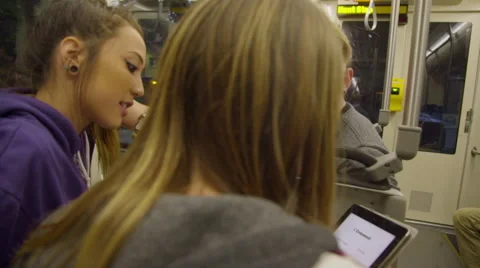 Group of teens use iPad Stock Footage 54261663