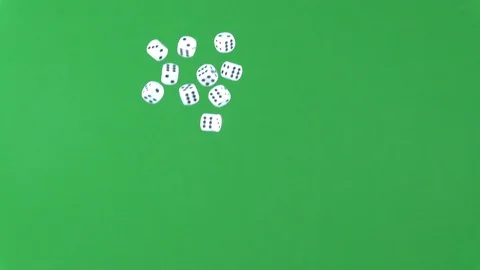 Group of ten white dice being thrown in the air isolated on green screen 動画素材 100617736